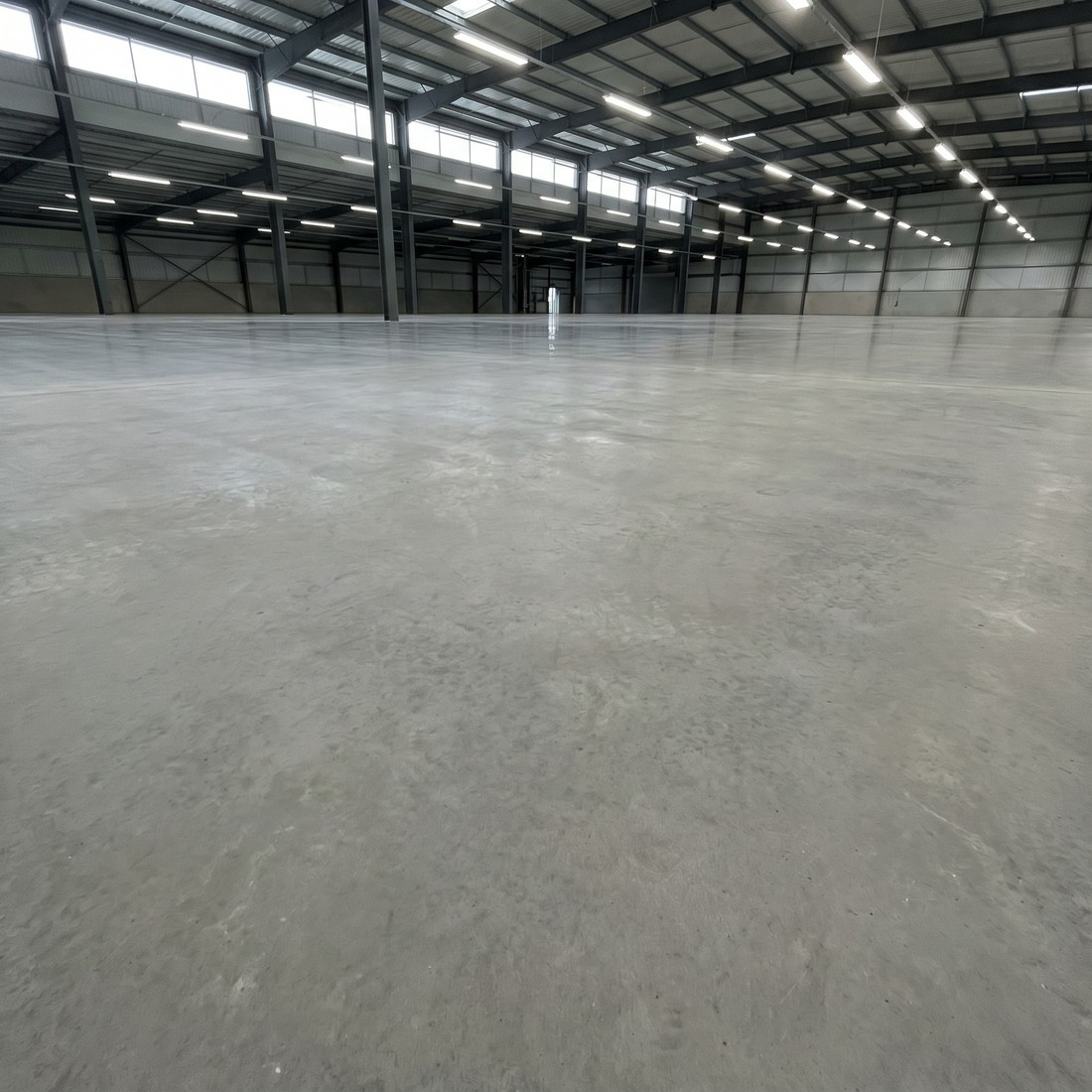 Raw unpolished warehouse concrete slab before polishing